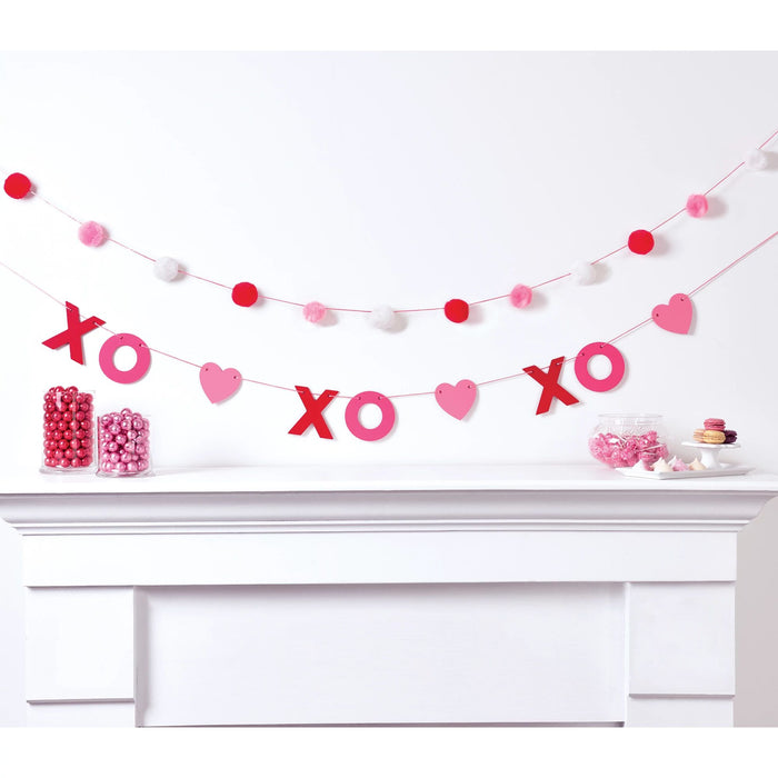 Add some love to your Valentine's Day decor with our XO Hearts Banners! Each set includes 2 banners, perfect for hanging on walls, mantels, or doorways. Made with high-quality materials, these banners will add a touch of romance to any celebration. Celebrate love with our Valentine's Day XO Hearts Banners!