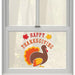 A 24 peice Thanksgiving Gel Cling Decal pack on a window.