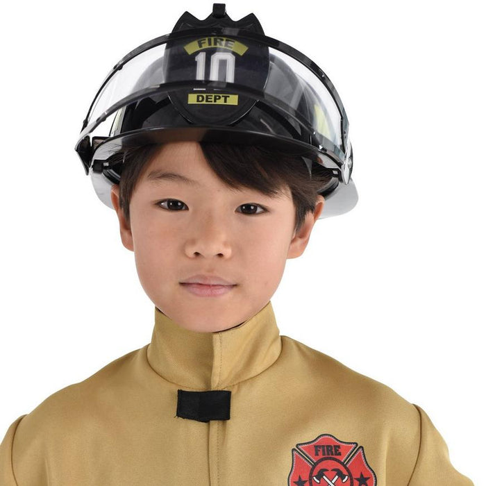 A boy wearing a Black Firefighter Helmet.