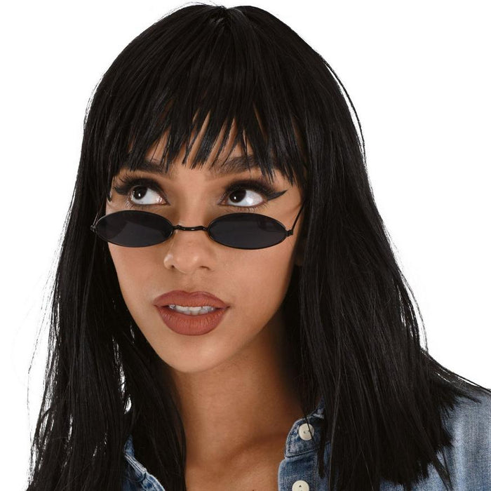 A women wearing a pair of 90s Mini Oval Sunglasses.