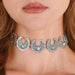 A women wearing a Western Faux Turquoise Metal Choker Necklace..