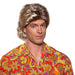 A man wearing a 70's Disco Adult Blond Wig.